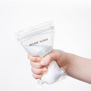 Hand holding a clear plastic bag with a white substance, against a white background