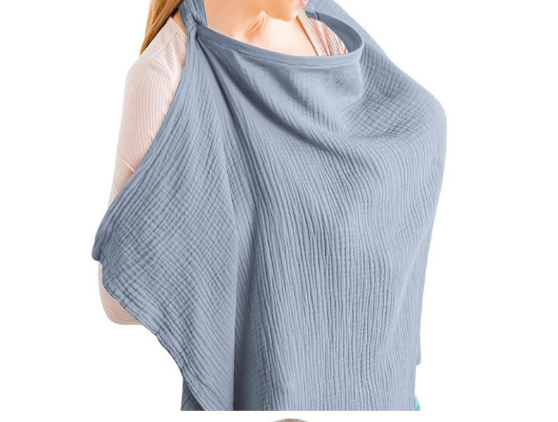 Blue baby carrier wrap draped over a mannequin on a white background