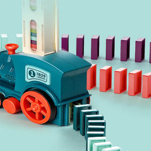 Toy train with colorful blocks on a light blue background