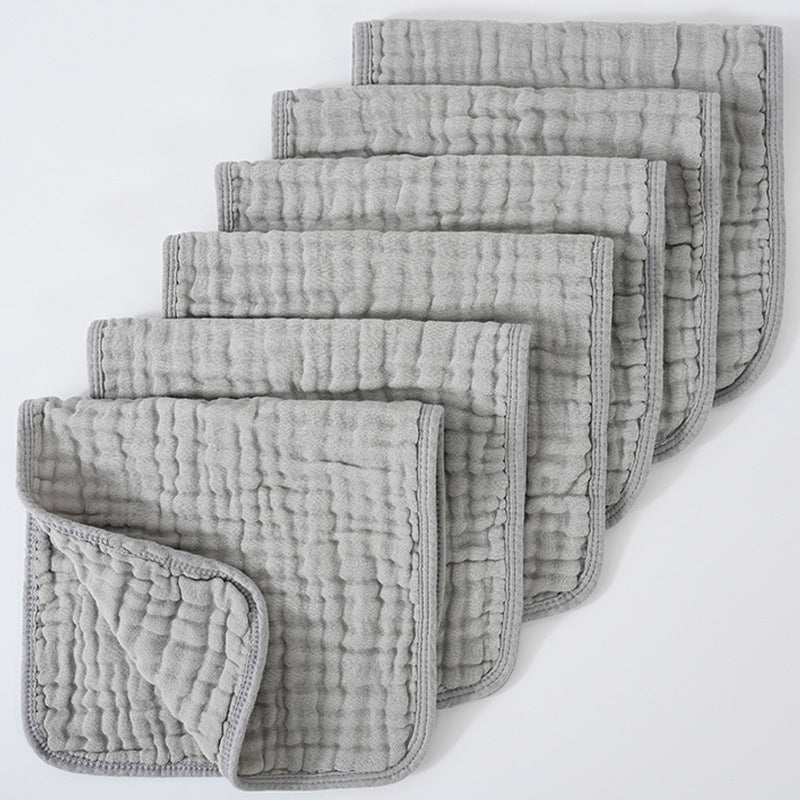 Set of gray textured cloths on a white background