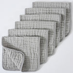 Set of gray textured cloths on a white background