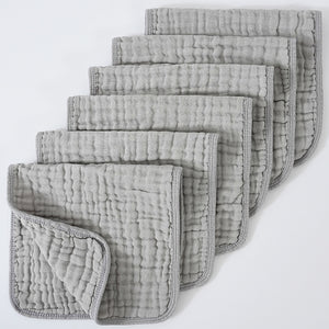 Set of gray textured cloths on a white background