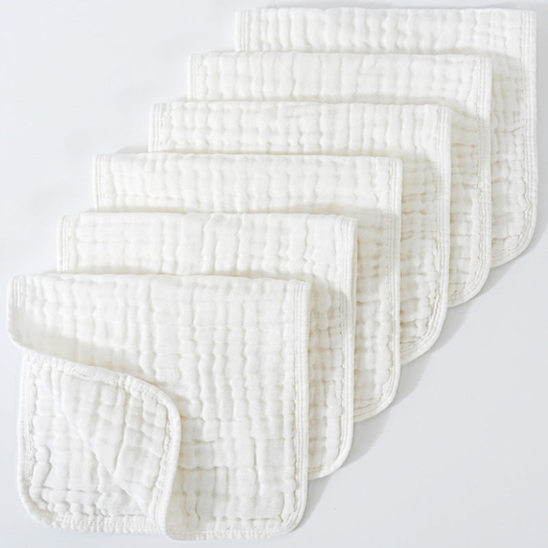 Set of white textured cloths on a light gray background