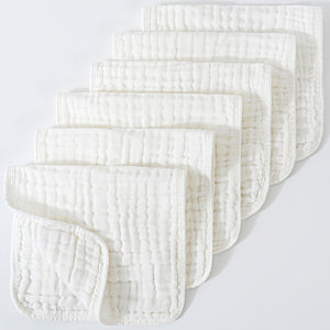 Set of white textured cloths on a light gray background
