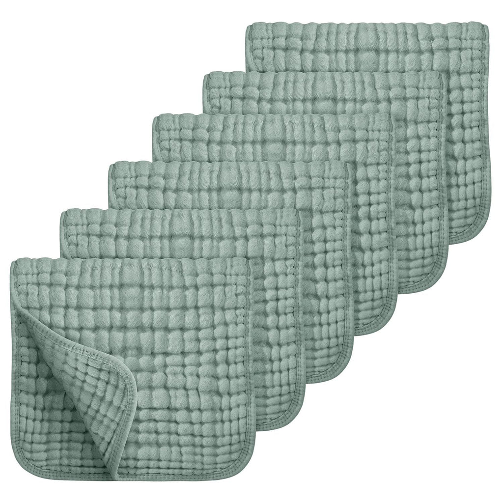 Set of six green textured cloths on a white background