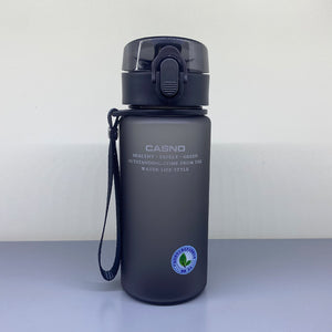 Black water bottle with a strap and logo on a light gray background