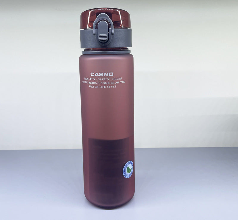 Brown water bottle with a gray cap on a white background