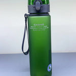 Green water bottle with a strap on a white background
