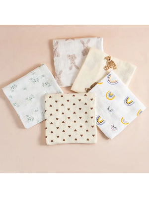 Set of five fabric swatches with different patterns on a beige background