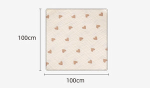 Beige mat with heart patterns and measurements on a white background