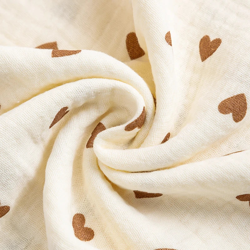 White fabric with brown heart patterns