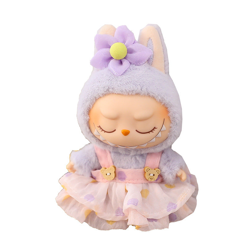 Plush toy with a hood and floral design on a white background