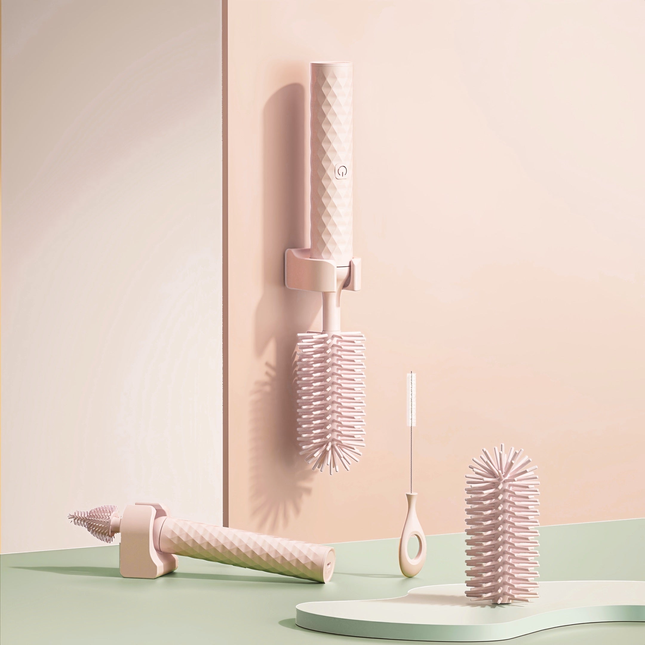 Set of pink hair care tools on a pastel background