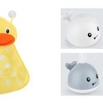 Two plush toys, a yellow duck and a gray whale, on a white background.