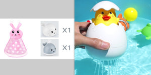 Bath toy with duck design and additional toys on a gray background