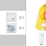 Yellow toy with a speaker, rabbit, bear, and whale toys on a gray background