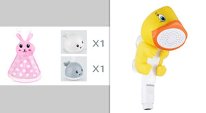 Yellow toy with a speaker, rabbit, bear, and whale toys on a gray background
