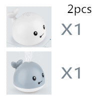 Two cartoon whale toys with text indicating quantity on a light gray background