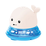 Toy with a whale design and blue base on a white background