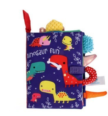 Children's soft book with dinosaur illustrations on a white background