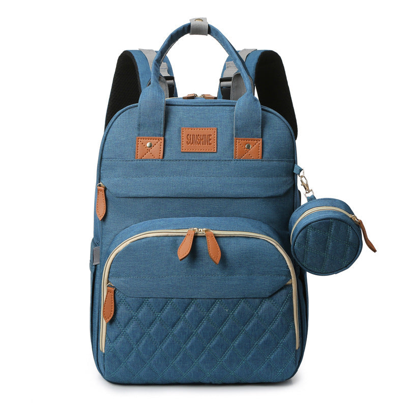 Blue backpack with matching pouch on a white background