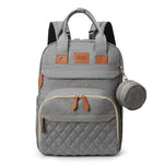 Gray backpack with quilted design and brown accents on a white background