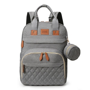 Gray backpack with quilted design and brown accents on a white background