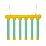 Yellow and green plastic tube toy on a white background