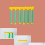 Toy with green and yellow bars on a pink background with text instructions.