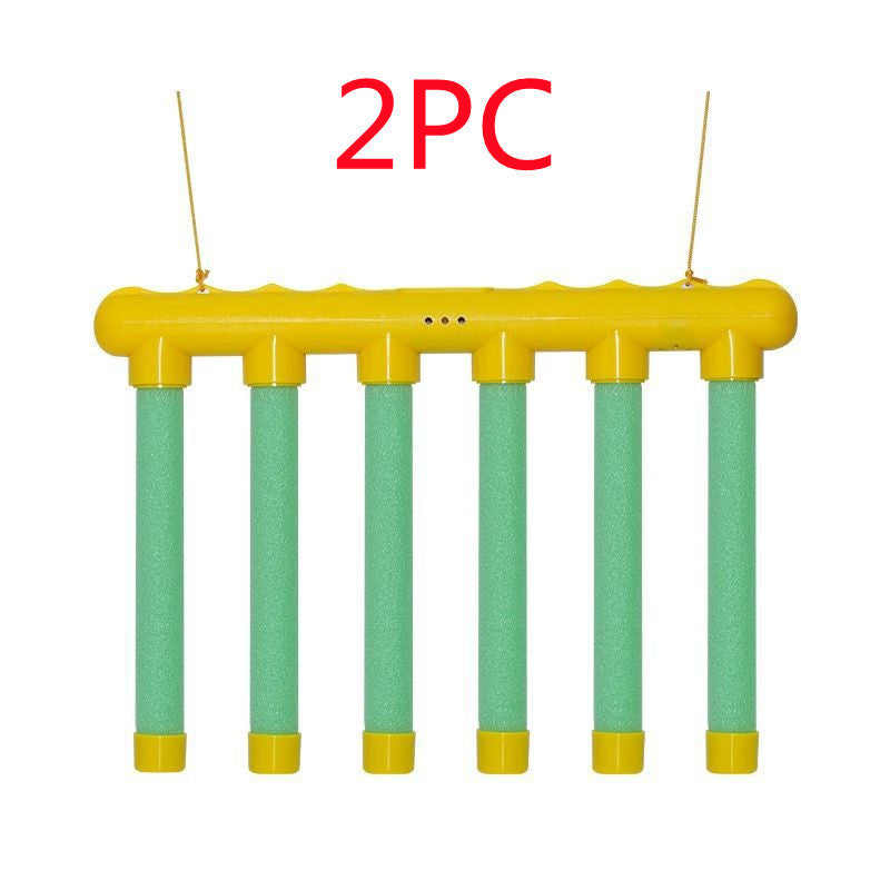 Yellow and green plastic structure with '2PC' text on a white background