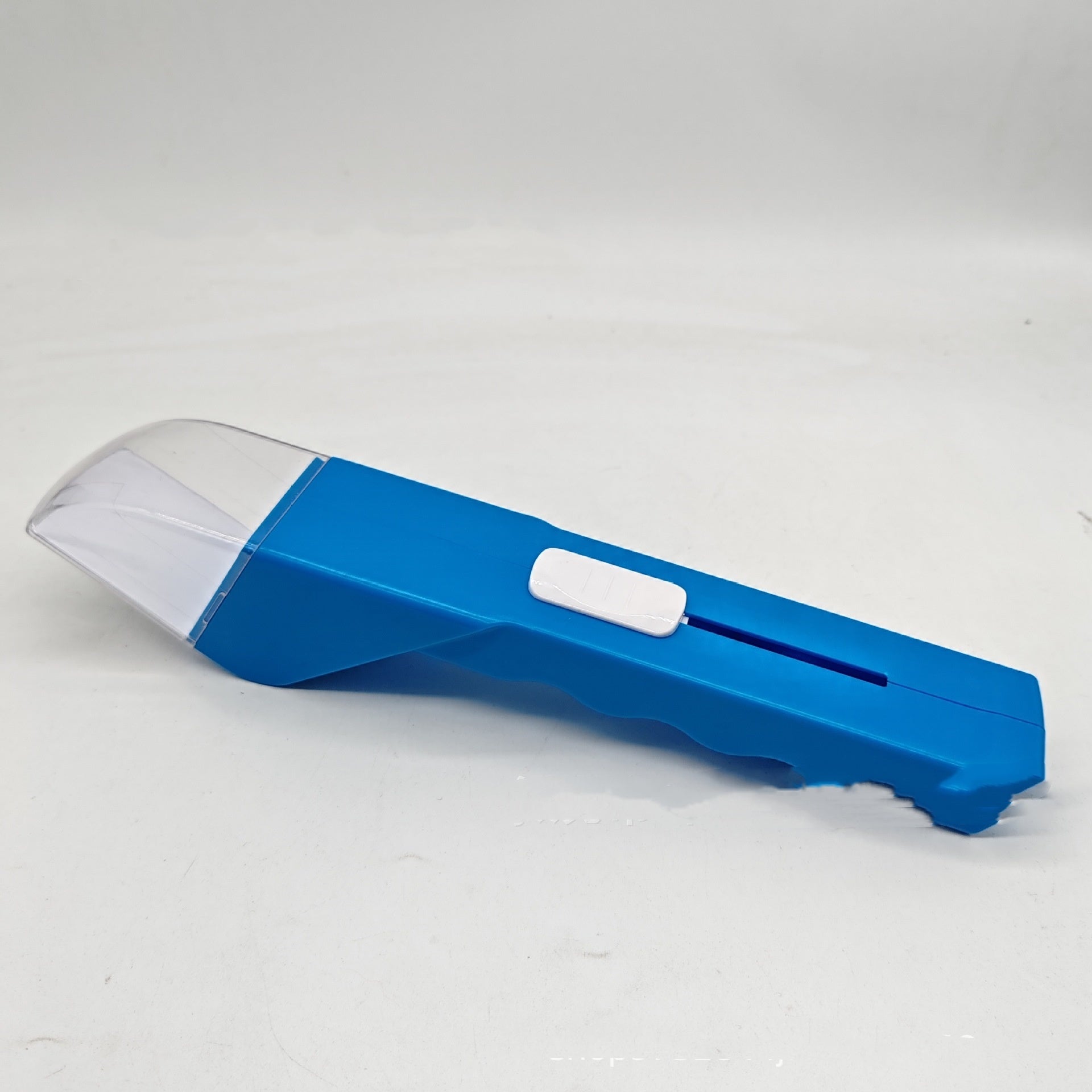 Blue and white tool on a light gray background