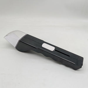 Black and white tool on a light gray background