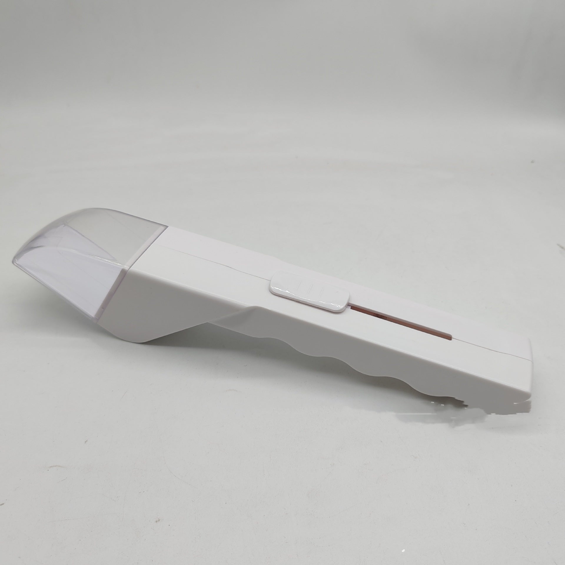 White electronic device on a gray background