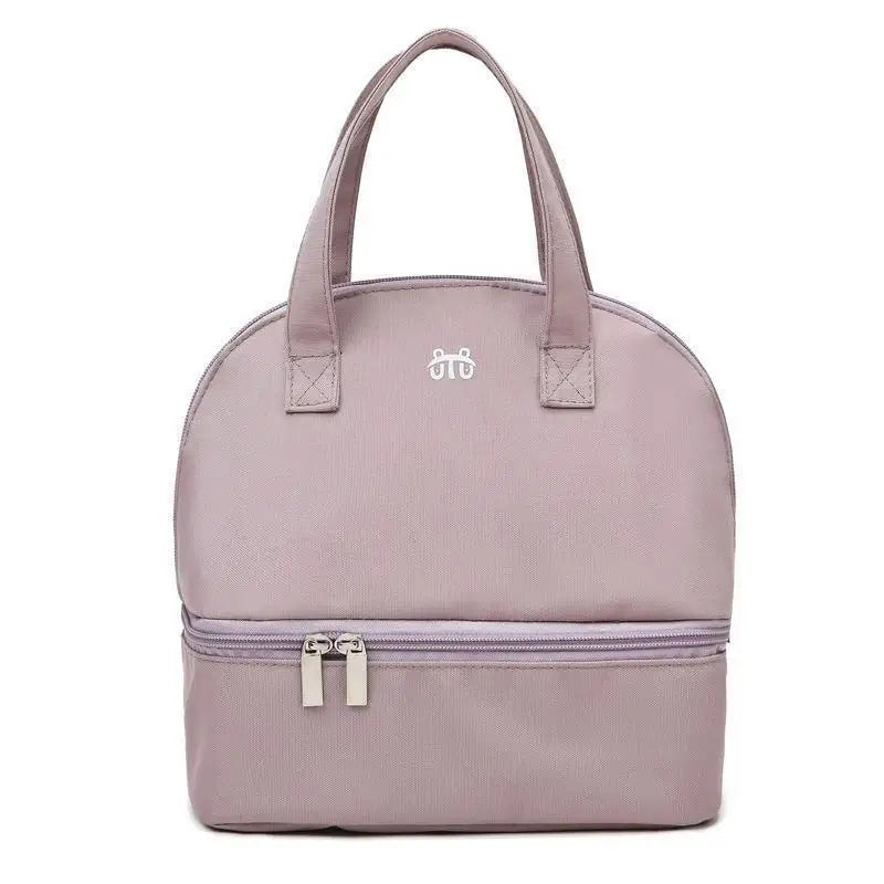 Pink handbag with a visible brand logo on a white background