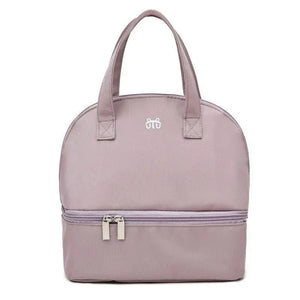 Pink handbag with a visible brand logo on a white background
