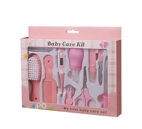 Baby care kit packaging with various tools on a white background