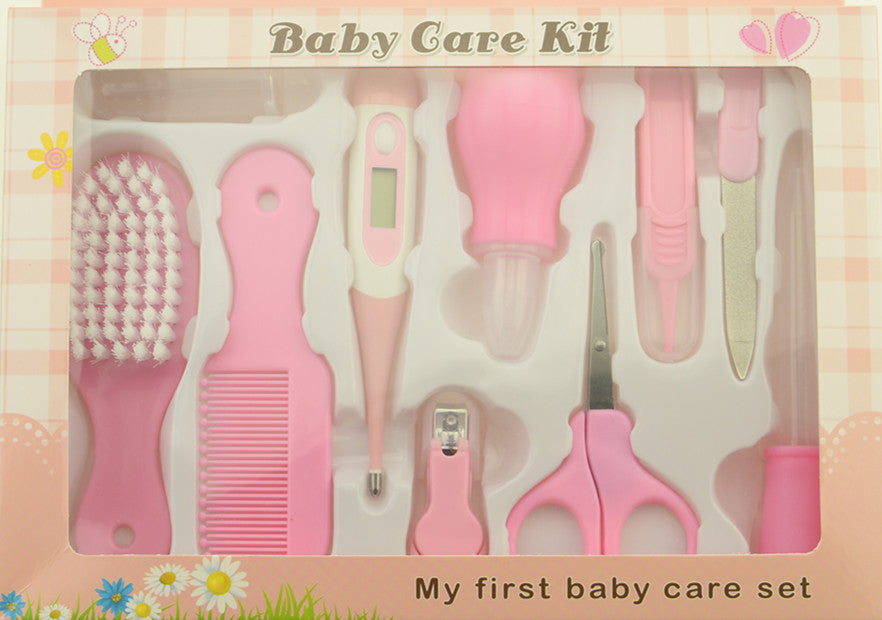 Baby care kit with various tools in a box labeled 'My first baby care set'.