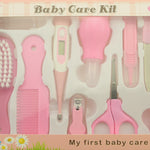Baby care kit with various tools in a box labeled 'My first baby care set'.