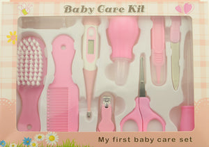 Baby care kit with various tools in a box labeled 'My first baby care set'.