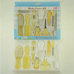Baby care kit with various tools in a clear plastic bag on a light background