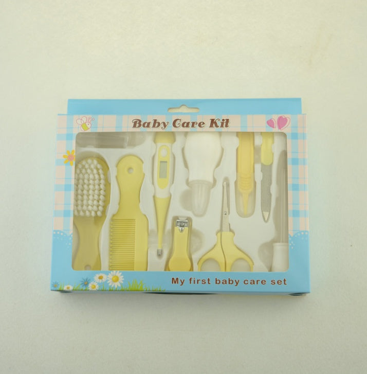 Baby care kit with various tools in a box labeled 'Baby Care Kit' on a light background.