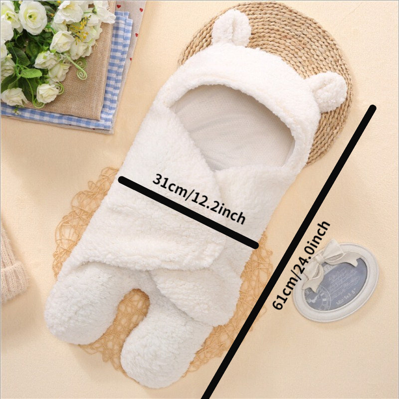 White plush toy with measurements on a beige background