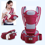Red baby carrier with a woman holding a baby in it, on a light blue background.