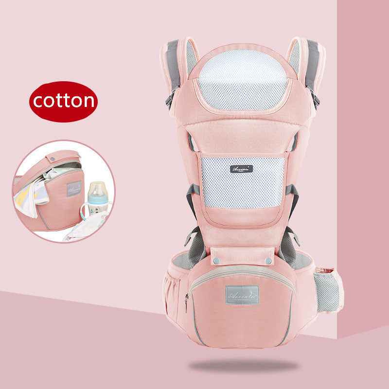 Pink baby carrier with 'cotton' branding on a pink background