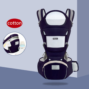 Baby carrier with a close-up inset on a light blue background, featuring the brand 'cotton'.