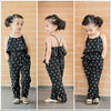 Three-panel image of a young girl wearing a black polka dot outfit against a brick wall.