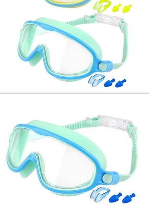 Two pairs of blue and green swim goggles with earplugs on a white background.