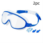 Blue and white swim mask with earplugs on a white background