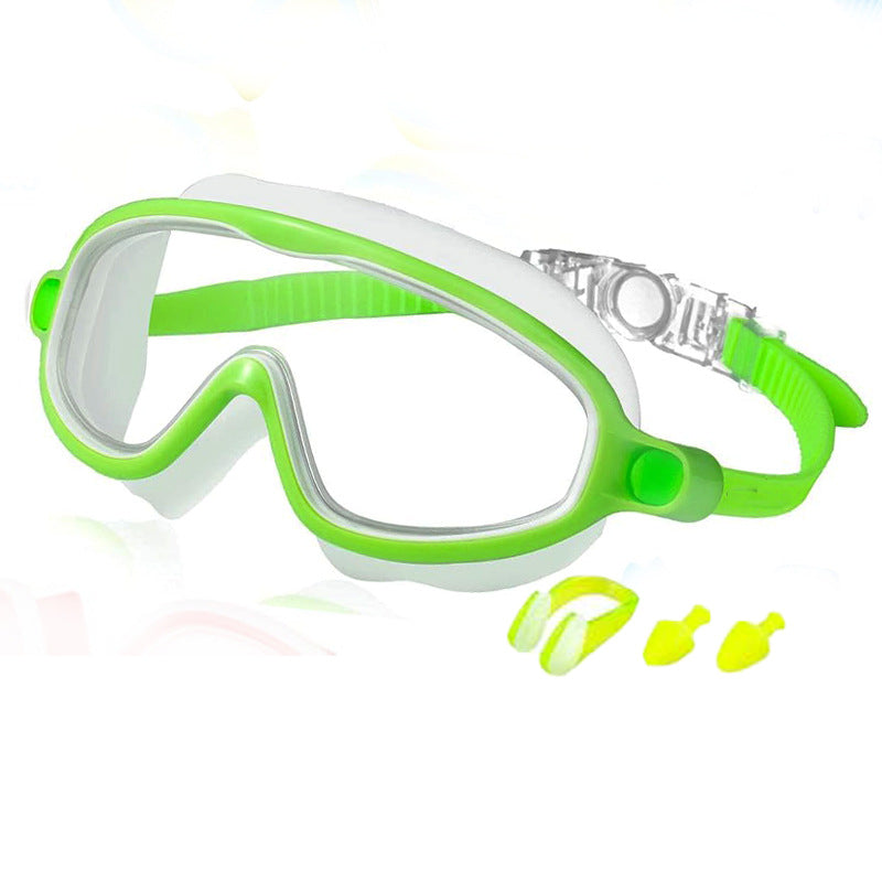 Green and white swim mask with earplugs on a white background