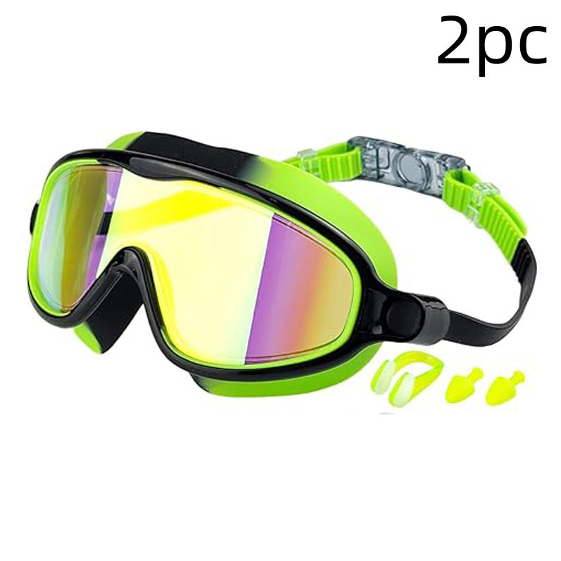 Neon green goggles with black frame and earplugs on a white background